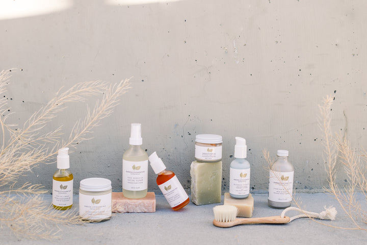 garden city essentials skin care products lined up in a clean minimalist setting