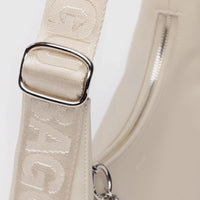stone baggu leather crescent bag zipper and hardward close up image