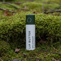 garden city essentials lip butter with chamomille and seabuckthorn in compostable push up tube