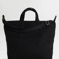 Black Baggu horizontal zip duck canvas bag with a shoulder strap on a white background