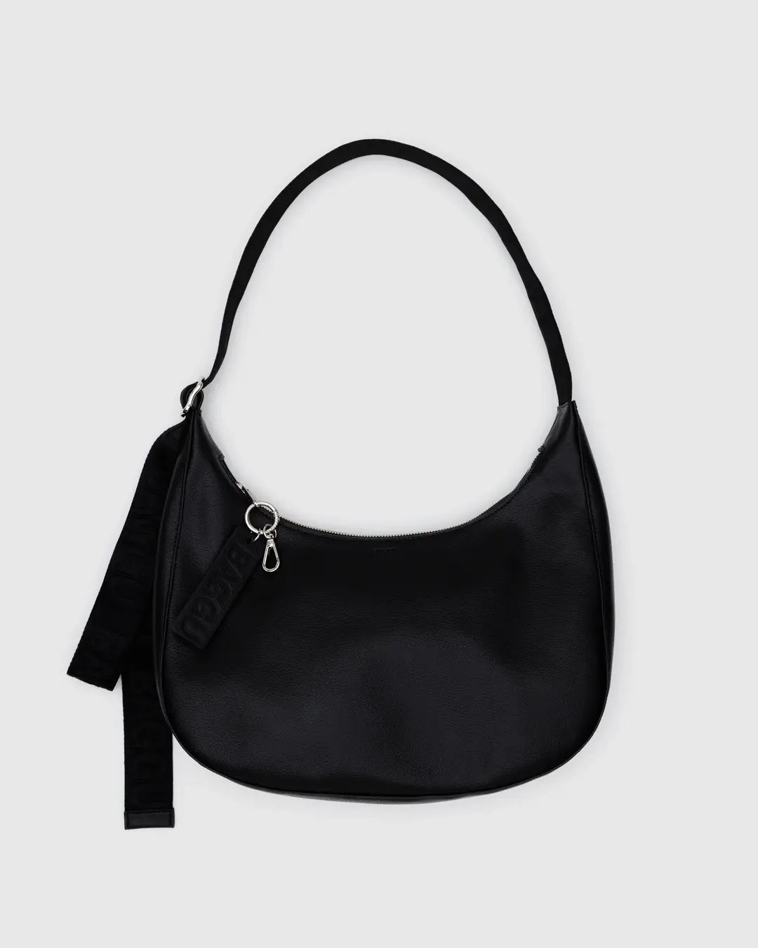 Black leather Baggu crescent bag on a light gray background