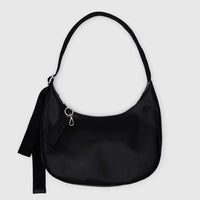 Black leather Baggu crescent bag on a light gray background