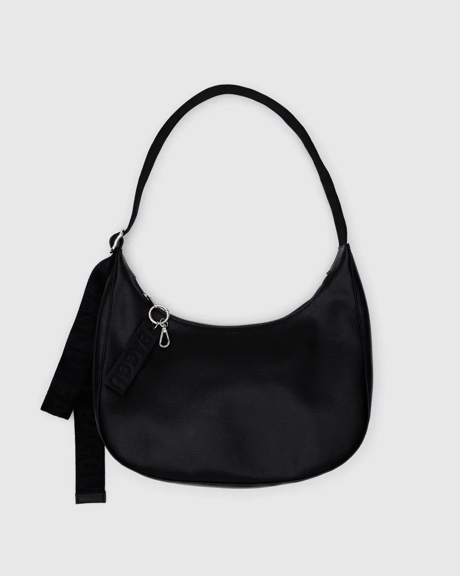 Black leather Baggu crescent bag on a light gray background