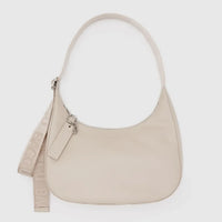 Stone Baggu leather medium crescent bag with a matching strap on a white background