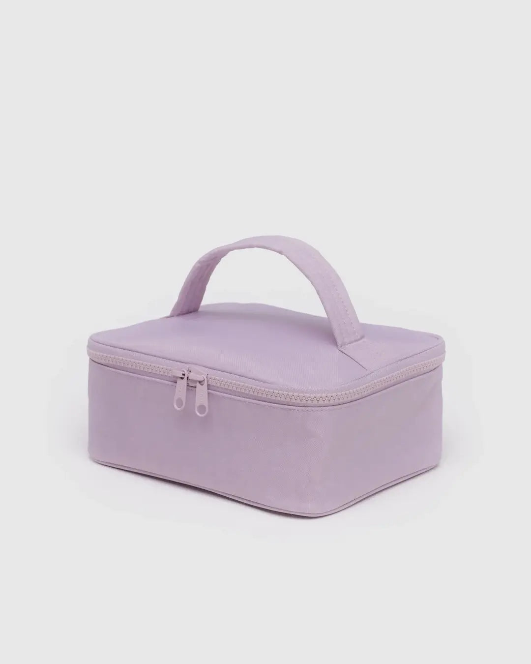 Dusty pink Baggu small cosmetic case with a handle and matching zipper