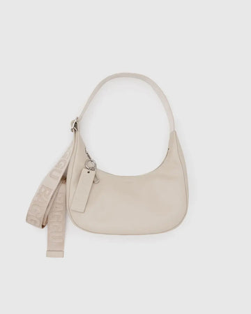 baggu small recycled leather crescent bag in 'stone' on a white background