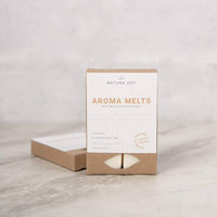 Box of Natura Soy Aroma Melts on a light gray background